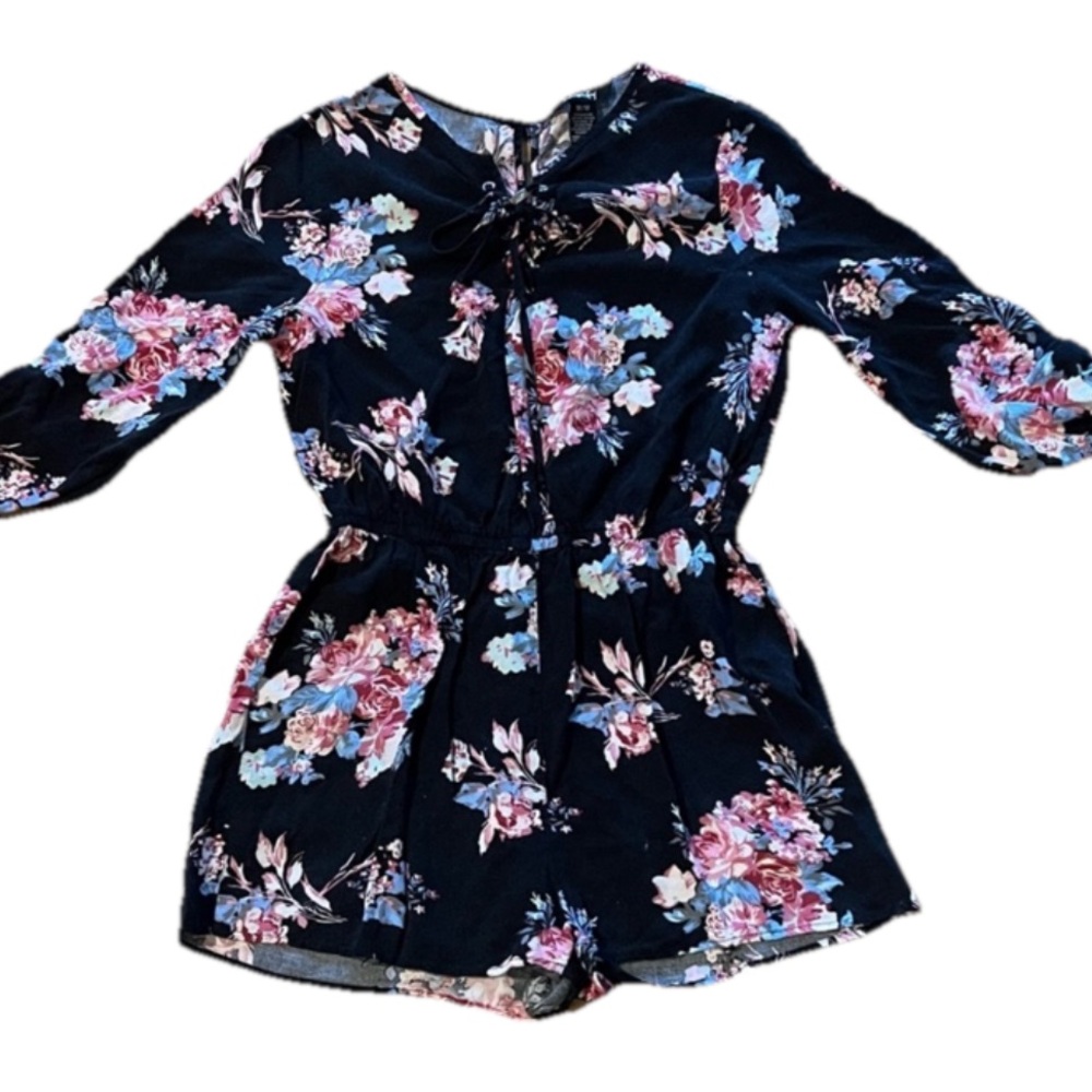 Floral romper with cut out in back 